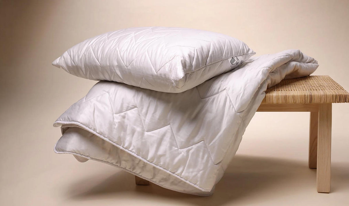 Complete the bed with plant-based warmth and a stable, ventilated platform